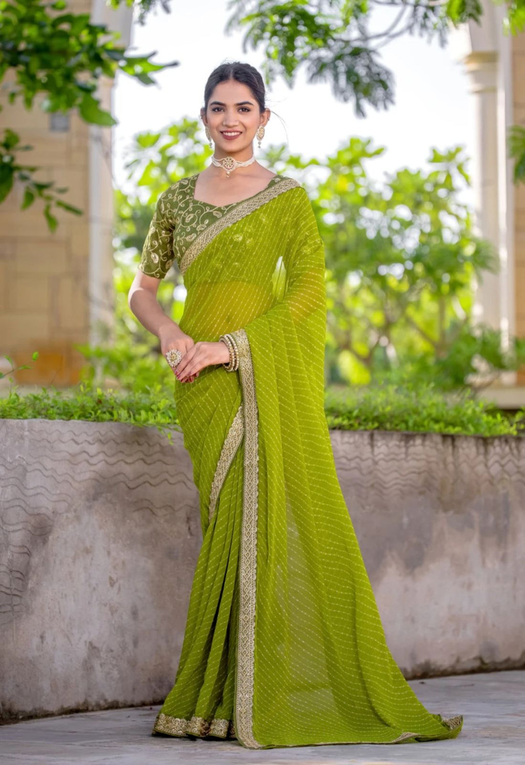 Festive Lime Green Striped Georgette Saree with Embroidered Lace Border